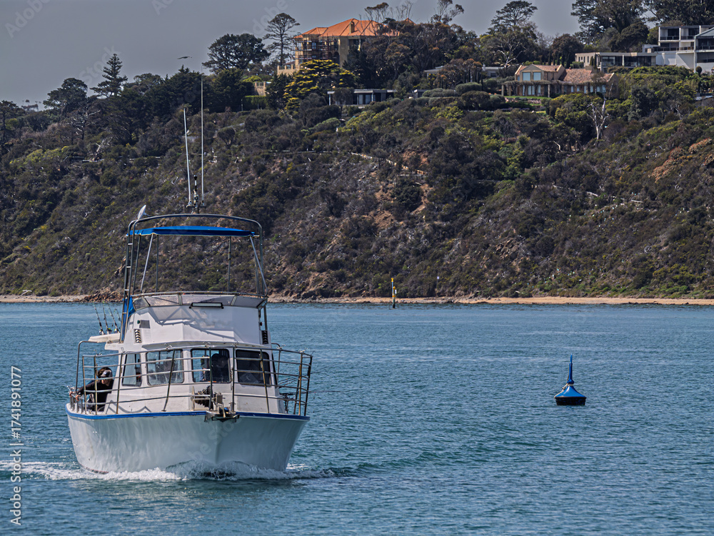 Obraz premium Incoming Fishing Charter In Calm Seas