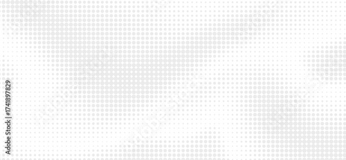 Subtle grey halftone pattern of circular dots fades across a white background, creating a modern and minimalist design with a gradient effect, ideal for backgrounds and overlays