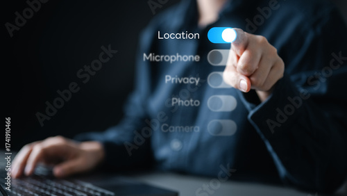 Fotografie Person adjusting digital privacy settings with location access toggle, concept of GDPR compliance, user permission, data control, online security, and personal information protection