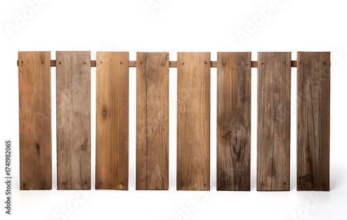 charmingly weathered wooden fence stretches, showcasing a diverse collection of wooden posts that exude a sense of rustic elegance.