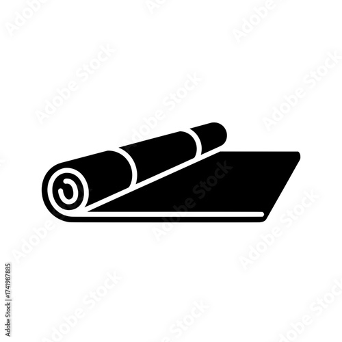 Yoga mat rolled up and partially unrolled on white background.