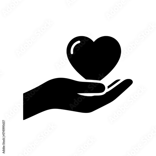 Hand holding a heart symbol of love and care charity concept giving and sharing.