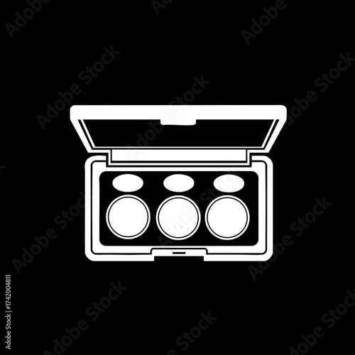 Open makeup palette with three eyeshadow pans and applicators.