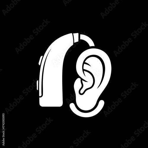 Hearing aid device on human ear for improved hearing.