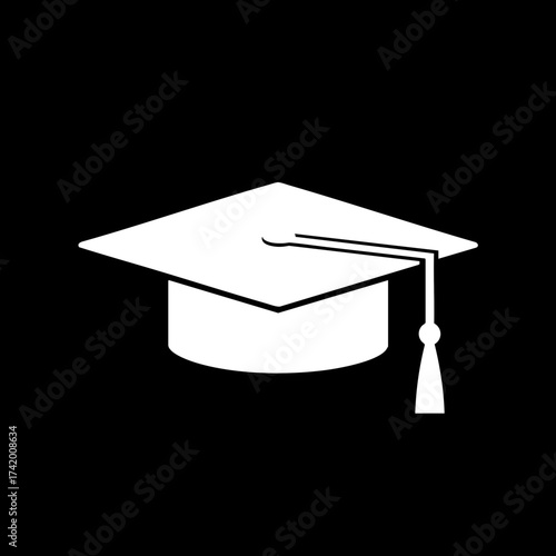 White graduation cap with tassel symbolizing academic achievement and educational success.