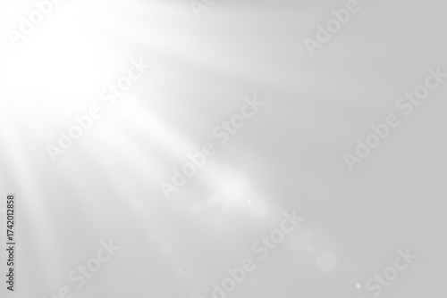 Fototapeta Bright sunlight rays shining down from above creating a dramatic light effect