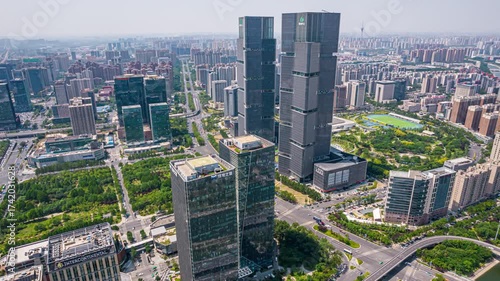 Aerial Time Lapse of Twin Towers in Zhengzhou City Center, China - Modern Urban Skyline Development