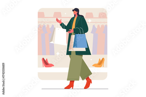Woman with shopping bags in a clothing store
