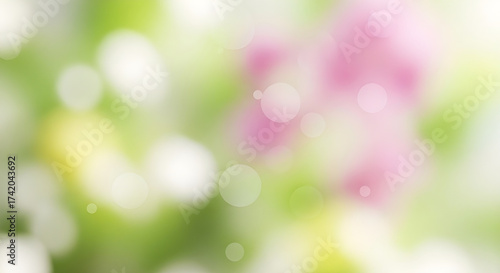 Abstract blurred background with pink and green colors
