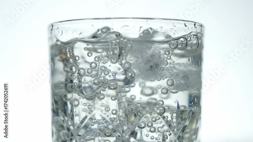 Sparkling Water Bubbles in Crystal Glass Refreshing Macro