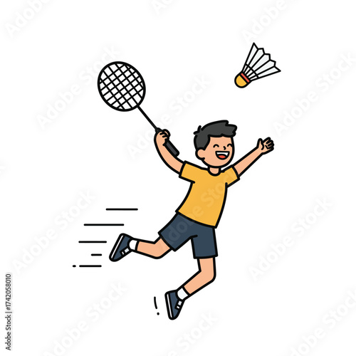 Energetic young boy joyfully leaps to hit a shuttlecock with a badminton racket during a game.