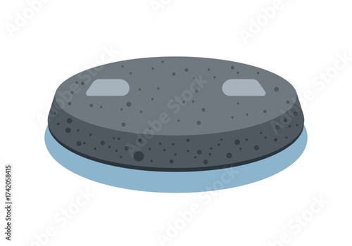 Stone object with two reflective surfaces on a light blue base.