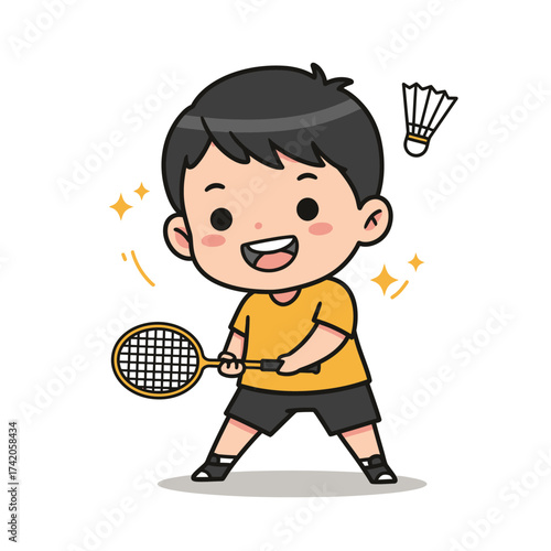 Joyful young boy enthusiastically plays badminton, hitting the shuttlecock with a racket in a dynamic pose.