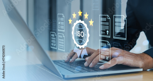 Quadro su tela ISO certification and quality standart concept with digital documents and rating stars on transparent interface over laptop screen in office background