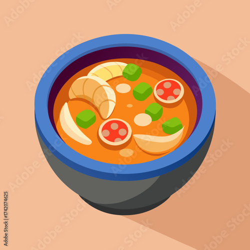 Isometric bowl of Tom Yum soup with prawns and vegetables