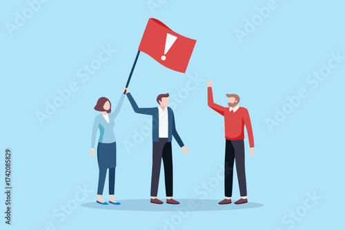 Team celebrating success holding a red flag with an exclamation mark and raising hands