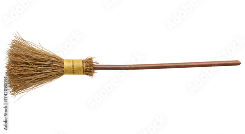 Traditional Straw Broomstick with Rustic Wooden Handle on Black Background