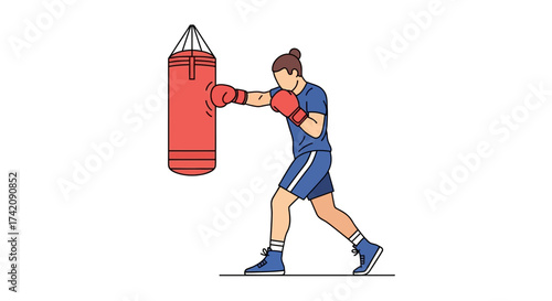 Determined female athlete in boxing gloves practicing her punching technique on a red heavy bag during a workout