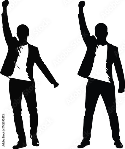 Two businessmen silhouettes raising fists in triumph celebrating success victory achievement