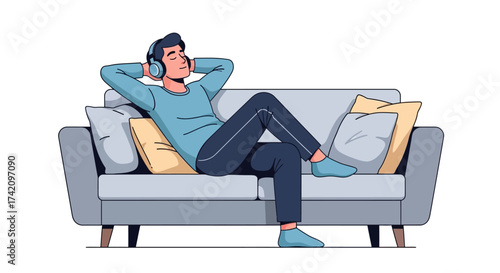 Man relaxing on couch listening to music with headphones, enjoying moment peace and quiet, comfortable leisure time at home