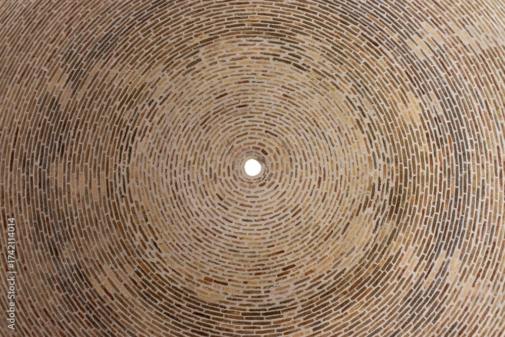 Naklejka premium Dome ceiling in mausoleum of Samanid Mausoleum from baked brick in Bukhara, Uzbekistan. Built in the 10th century CE. UNESCO World Heritage Site