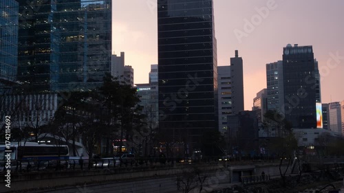 Seoul, South Korea. View of skyscrapers in Seoul, South Korea. Time-lapse during a cloudy sunset evening in spring, zoom in
