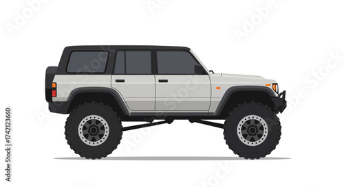 Lifted Gray Four-Door SUV with Black Roof and Oversized Off-Road Tires.
