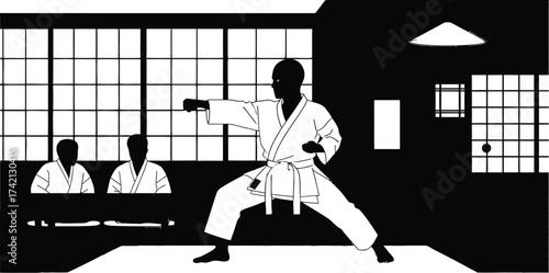 Man in karate gi performing punch with observers in background editable stock