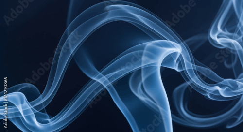 Blue smoke swirling in dark background.