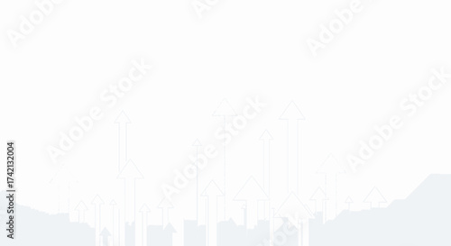 Foggy cityscape with silhouette of buildings and mountains.