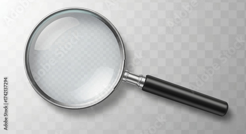 A clear close up of a magnifying glass on a checkered background revealing an object of extreme detail with sharp focus