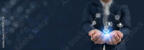 Customer experience and digital marketing concept. Holding digital customer experience icons, symbolizing customer experience, satisfaction, online shopping, customer centric and digital engagement.