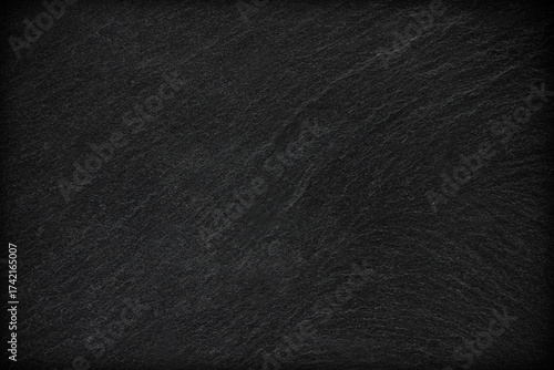 Dark grey black slate background or texture.