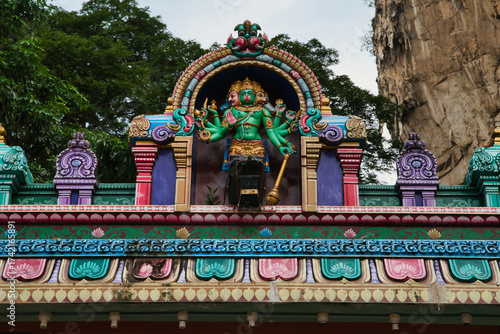 Wallpaper Mural Statue of Panchamukhi Hanuman Hindu temple, Batu Caves in Kuala Lumpur, Malaysia. Hinduism, Indian mythology, sculpture of deities, and religious art. Torontodigital.ca