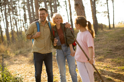 Friends enjoy a sunny hike ...