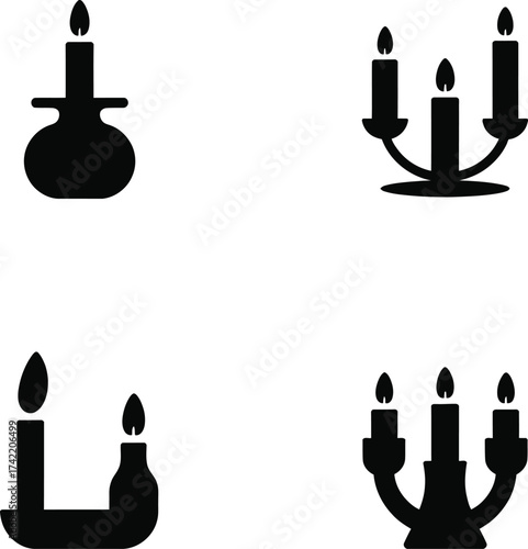 Collection of four distinct candle and candelabra icons in silhouette style
