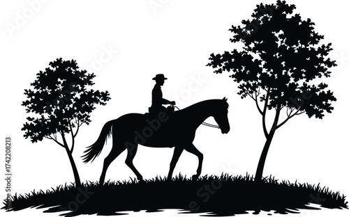 Silhouette of horse and rider between trees on grassy hill editable stock
