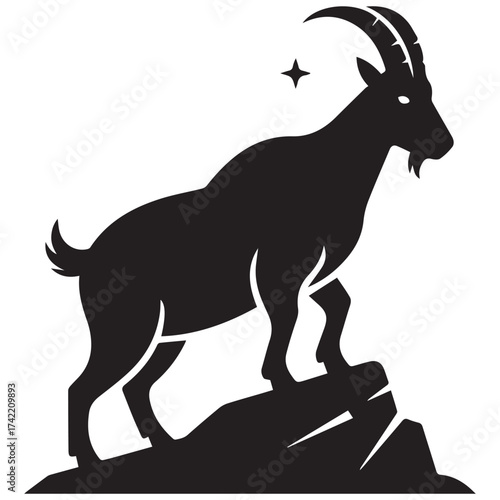 Majestic capricorn silhouette on rocky outcrop
