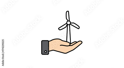 Green energy concept with hand holding wind turbine icon for sustainability.