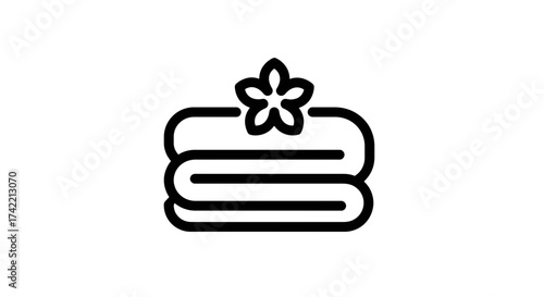 Spa towels with flower icon for relaxation and hygiene.