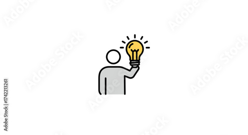 Person holding a glowing light bulb representing an idea.