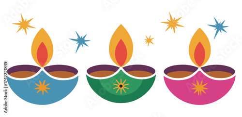 Three colorful traditional indian diyas illuminated with bright flames and sparkling stars