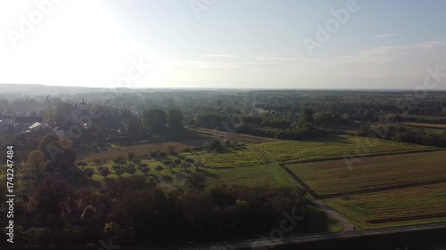 Foggy Morning Over Farmland and a Small Polish Village