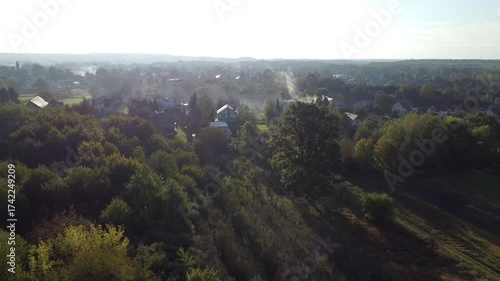 Foggy Morning Over Farmland and a Small Polish Village