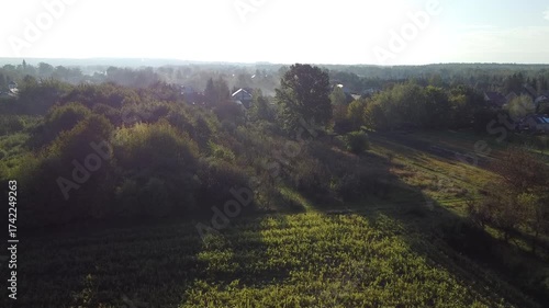 Foggy Morning Over Farmland and a Small Polish Village