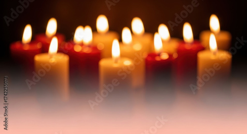 Wallpaper Mural Burning candles illuminated against a dark background with soft warm lighting effects Torontodigital.ca