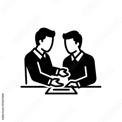 Two businessmen shaking hands over a table business meeting concept.