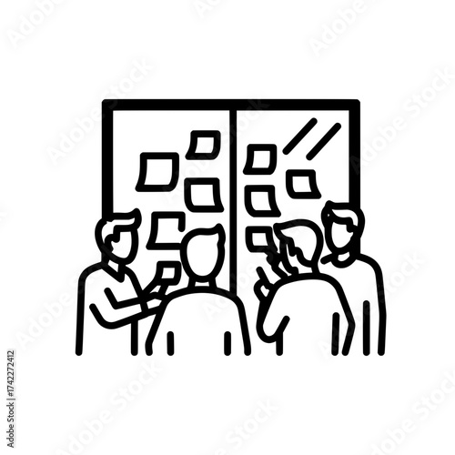 Team members brainstorming ideas using sticky notes on a board.