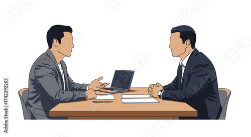 Two businessmen in suits sitting at a table during a meeting.
