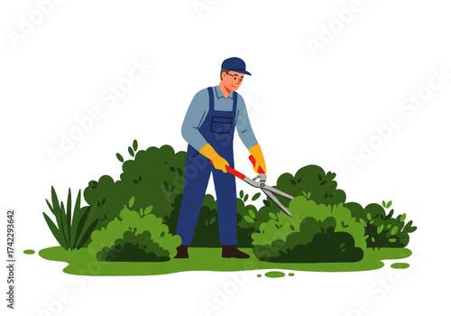 Gardener trimming bushes with shears, wearing overalls, gloves, and a cap, working outdoors on a sunny day.